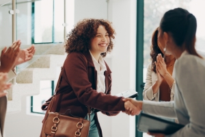 Newly Joined Emergency Employee Shaking Hand with Office Staff