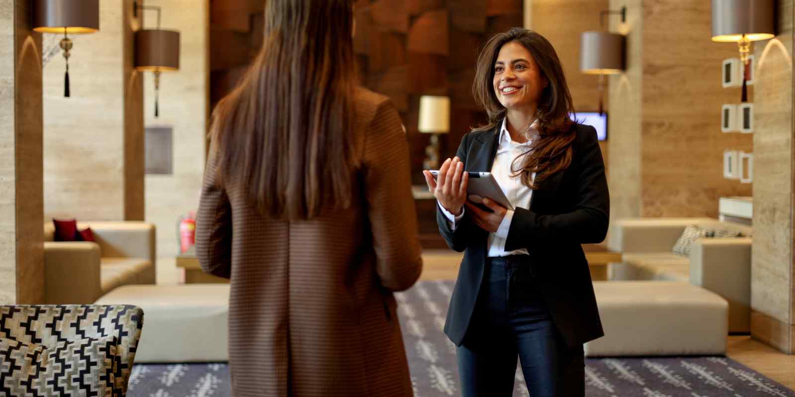 Concierge Services Staff Welcoming A Customer in Hotel