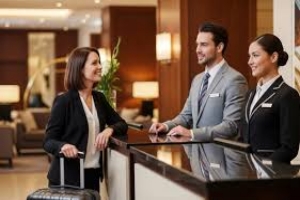 Hotel Staff Welcoming A Guest at Reception