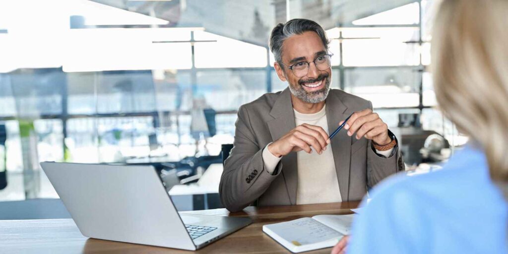 Smiling Employment Services HR Having Interview of A Candidate