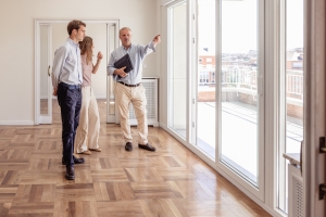 Agent Showing Apartment to A Couple for Leasing
