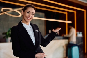 Smiling Concierge Welcoming Guests in Apartment Building
